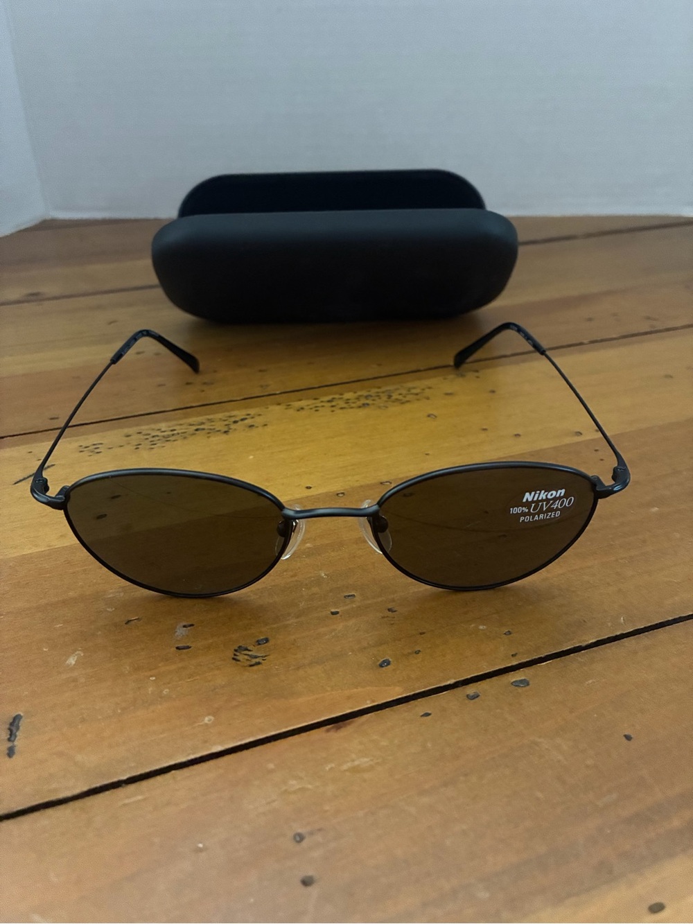 Nikon Oval Polarized Sunglasses — Black Lenses